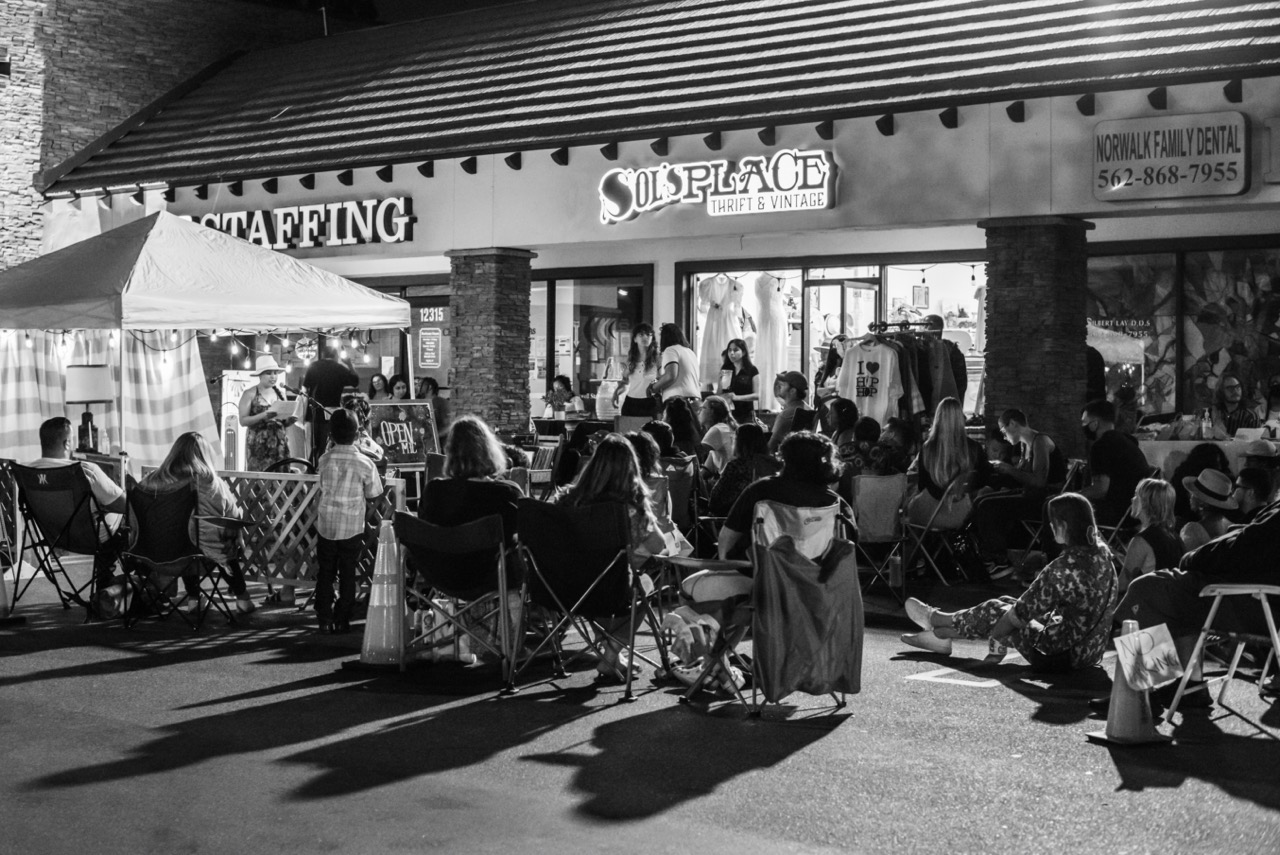 Art of Nothing Press Event in front of strip mall vintage store